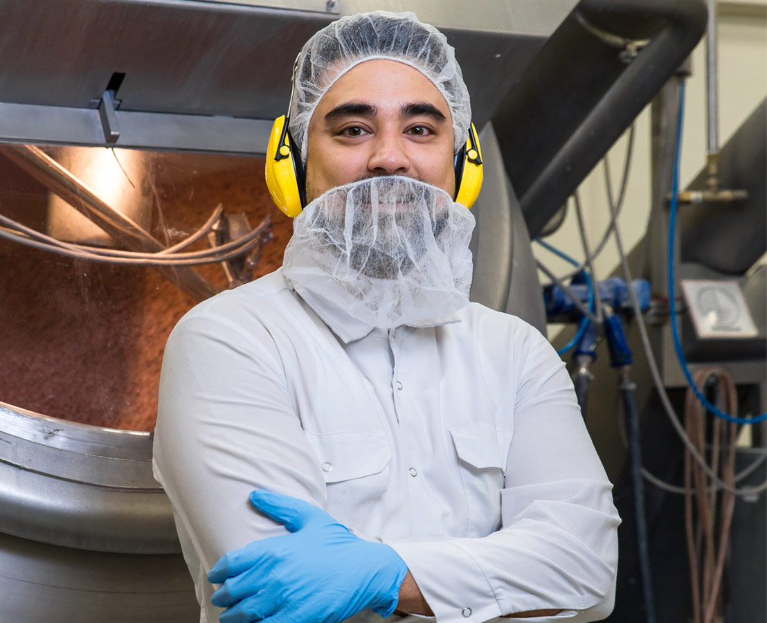 Bild eines Mannes in Laborkleidung.